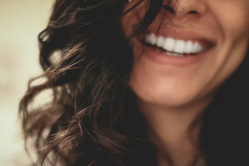 Most people only think about their teeth when something hurts. A twinge. A sensitivity. A filling that feels loose. Then the appointment gets booked, the problem gets fixed, and life moves on until the next issue surfaces. It is understandable. But it misses something important. Your mouth is connected to your heart, your lungs, your blood sugar, and your immune response. Researchers have been mapping these connections for decades, yet most people never hear about them in a routine check-up. [ IMAGE 1 ] Your Mouth and Your Heart Have More in Common Than You Think The mouth hosts hundreds of bacterial species. In a healthy mouth, they coexist without causing problems. When the balance shifts, certain bacteria become destructive. They inflame gum tissue — and that inflammation does not stay put. Studies in cardiovascular medicine have found consistent associations between gum disease and elevated heart disease risk. The mechanism is surprisingly direct: bacteria from infected gum tissue enter the bloodstream and travel to arterial walls. Researchers have actually found oral bacteria inside arterial plaque samples. That shifted the conversation from statistical association to something far more specific. Diabetes adds another layer. People with poorly controlled blood sugar tend to have more severe gum disease, and untreated gum disease appears to make blood sugar harder to regulate in return. It runs both ways. Respiratory health is also gaining attention — bacteria from the mouth have been linked to pneumonia and lung infections, particularly in older adults. In pregnancy, gum disease has been associated with preterm birth and low birth weight, and some health systems now recommend dental check-ups as standard prenatal care. The Inflammation Factor Nobody Talks About Short-term inflammation is useful — it is the body defending itself. Chronic, low-grade inflammation that drags on for months or years is something else entirely. It sits at the root of heart disease, type 2 diabetes, certain cancers, autoimmune disorders, and cognitive decline. Advanced gum disease is a chronic inflammatory condition. The gums become a persistent source of immune activation, and the chemicals produced — called cytokines — circulate through the body. This is why dental health is no longer just about avoiding cavities. It is about managing one genuine contributor to body-wide inflammation. Gum disease is largely preventable and responds well to treatment. Adults who have drifted away from regular dental care often find that re-establishing it is one of the more impactful decisions they can make. Finding a dentist in Brighton or a trusted local practice and booking that overdue check-up is a reasonable first step. Not perfection — just professional oversight back in the picture. [ IMAGE 2 ] Why Childhood Sets the Trajectory There is a concept in medicine called the critical window — a period in development when habits and exposures have an outsized effect on long-term outcomes. For oral health, that window opens early. Children who see a dentist regularly from a young age get more than clean teeth. They get comfortable with the environment, and that matters more than most parents realise. Dental anxiety stops many adults from seeking timely care, and a significant amount of that anxiety traces back to early experiences. Primary teeth matter too. They hold space in the jaw for permanent teeth, support speech development, and allow children to eat without pain. When lost too early through decay or infection, they disrupt everything that follows. There is a social dimension as well. Children with visible decay or dental pain often hold back — they avoid smiling, eat less comfortably at school, and stay quiet in class. Getting children into a supportive, child-focused environment early makes a genuine difference. Families who want that specialist approach will find that a dedicated kids dentist Newtown or a similarly focused local practice offers both clinical expertise and the patient manner that makes dental visits manageable rather than dreaded. [ IMAGE 3 ] What Good Daily Habits Actually Look Like Brushing twice a day with fluoride toothpaste is still the foundation. Two minutes is the clinical recommendation — most people do around 45 seconds. A simple phone timer changes this more than any gadget will. Electric toothbrushes consistently outperform manual ones in the research, particularly along the gumline. Flossing clears the contact points between teeth that bristles cannot reach — precisely where decay and gum disease most often begin. If flossing feels awkward, interdental brushes are easier and equally effective. Diet matters more than most people expect, but perhaps not in the way they think. Frequency of sugar exposure is more damaging than total intake. Each sugary encounter triggers an acid attack on enamel lasting around 20 minutes — sipping a soft drink across three hours is far harder on teeth than something sweet eaten once with a meal. Stress is the overlooked factor. It contributes to grinding and clenching during sleep, which wears enamel and can fracture teeth over time. A dentist can spot the signs early and recommend a night guard before real damage accumulates. Why Waiting Almost Always Costs More A small cavity caught early takes minutes to treat. Left alone, it reaches the nerve — meaning root canal treatment. Left longer still, the tooth may not be salvageable at all. Then comes the extraction, the bone loss, the shifting of adjacent teeth, and eventually the conversation about implants or bridges. At every stage the cost increases. The treatment that costs least and causes least discomfort is always the earliest one. Gum disease follows the same pattern. Early-stage gingivitis reverses with a professional clean and better home care. Advanced periodontitis involves bone loss that cannot be restored, only managed. The only thing separating those two outcomes is usually how long treatment was delayed. Rethinking What Dental Care Is Actually For Your mouth is not separate from your health — it is part of it. Treating dental care as optional, or as something to deal with only when things go wrong, ignores what the evidence has been building toward for years. For adults, that means a regular check-up rhythm with a practice you trust. For parents, it means introducing dental visits early, keeping them calm and low-key, and not letting your own anxieties pass to your children. The research keeps deepening and the connections between oral health and the rest of the body keep getting clearer. Taking care of your mouth is, increasingly, one of the more straightforward things you can do for your overall health. Disclaimer: The information on MedicalResearch.com is provided for educational purposes only, and is in no way intended to diagnose, cure, or treat any medical or other condition. Some links are sponsored. Products, services and providers are not warranted or endorsed by MedicalResearch.com or Eminent Domains Inc. Always seek the advice of your physician or other qualified health and ask your doctor any questions you may have regarding a medical condition. In addition to all other limitations and disclaimers in this agreement, service provider and its third party providers disclaim any liability or loss in connection with the content provided on this website.
