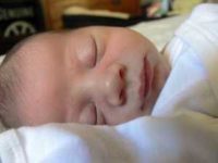 “Sleeping baby - 10 days old” by Jessica Merz is licensed under CC BY 2.0